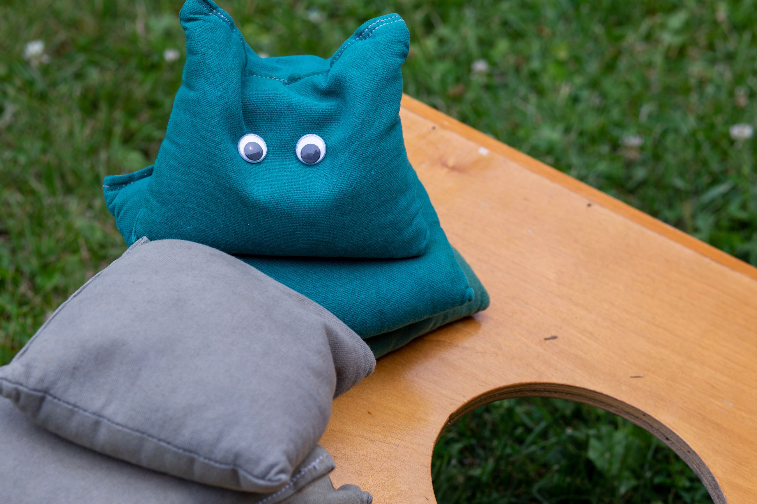 A view of halloween bags tournament board with googly eyes on a bag.