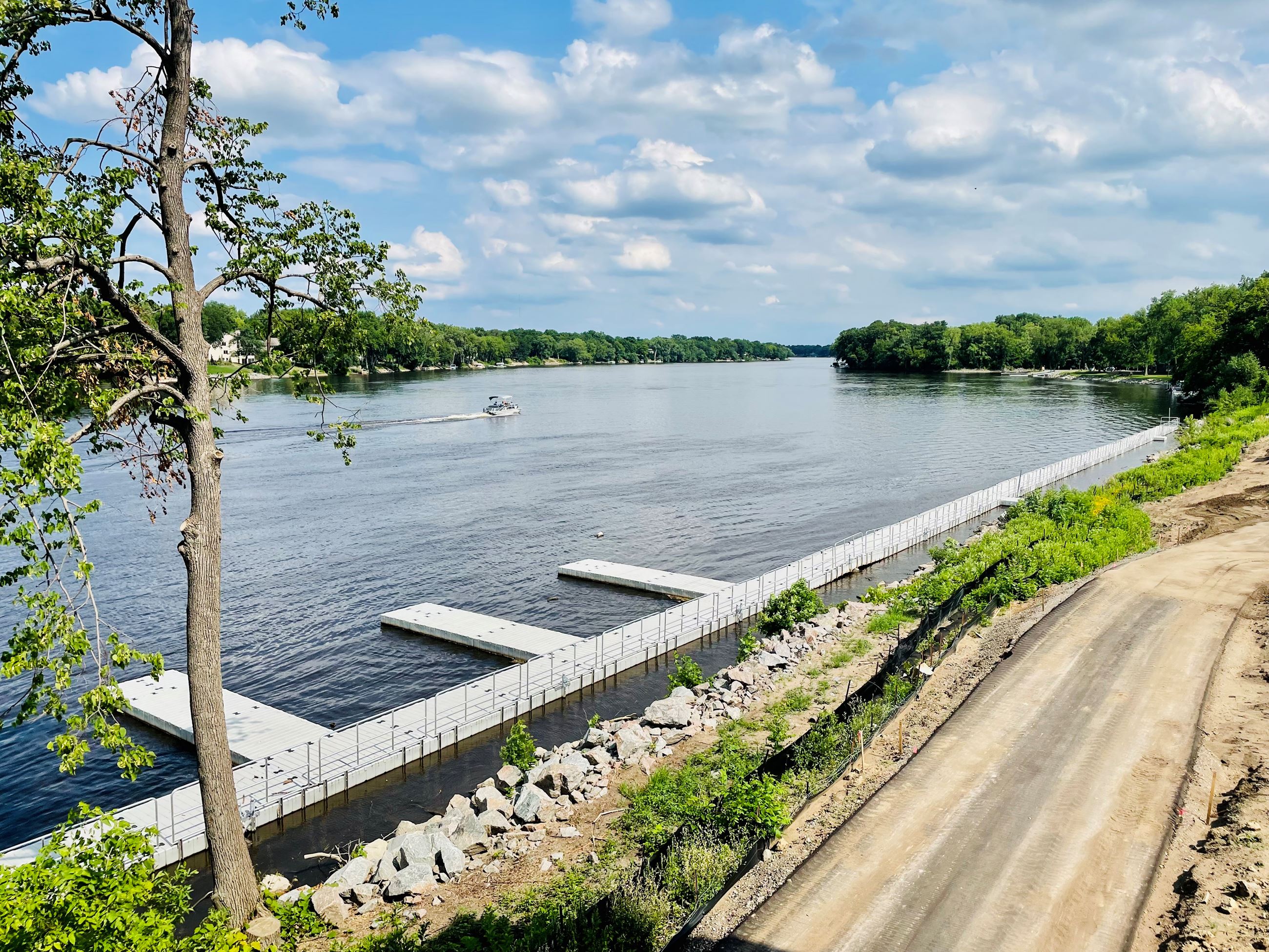 A view of the public docks showing watercraft slips at Mississippi Crossings.