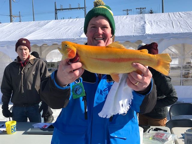 Happy Person Holding Fish